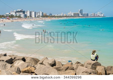 Miami,usa-march 15,2018:people On Hte Beach In Miami Beach South Point Park Pier During A Sunny Day.