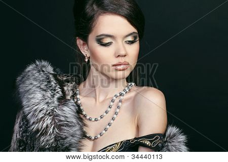 Fashion Attractive Woman In Fur Coat