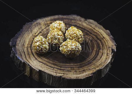 Tilgul Or Sweet Sesame Laddu For Indian Festival Makar Sankranti, Sesame Seed Ball And Tilgul. Speci