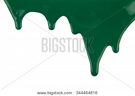 Abstract Artistic Paint Green Color Dripping Over White Background. Color Dropping Background