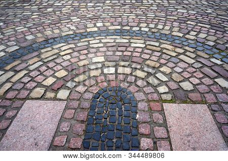 Pattern of stone pavement in Bodenwerder, Germany.