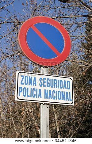 Zona Seguridad, Policia Nacional No Parking Traffic Sign. Security Zone, National Police In Spanish.