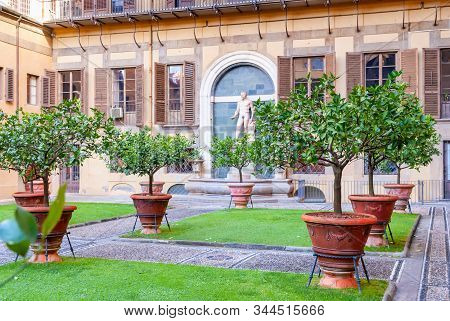 Outer Courtyard Of The Medici Riccardi Palace, Which Has An Italian Garden With Statues And Tubs Wit