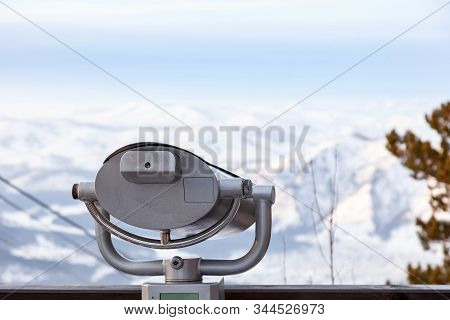 Stationary Binoculars On The Observation Deck In The Altai Mountains In Winter With Snow And Beautif