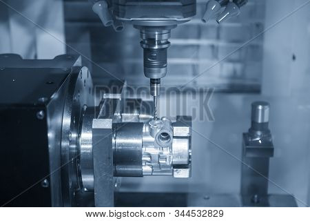 The  Multi-axis  Cnc Milling Machine  Tapping The Thread At The Aluminium Casting Parts By Tapping T