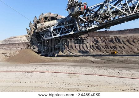 The Work Of A Bucket Wheel Excavator In A Quarry. Ore Mining In A Quarry.