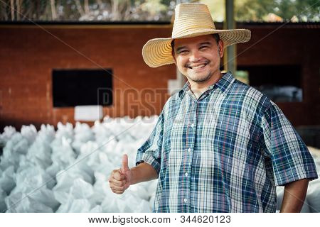 Farmer Agriculturist With Organic Fertilizer