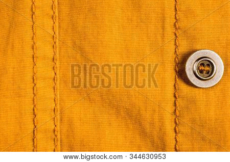 Clothing Items Stonewashed Cotton Fabric Texture With Seams, Clasps, Buttons And Rivets, Macro