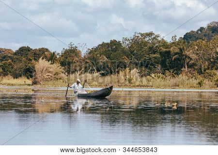 Maroantsetra, Madagascar October: 19.2016: Native Malagasy Man Fishing On River, Using Technique Pul