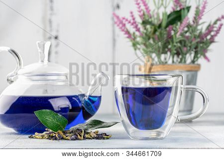 Cup Of Butterfly Pea Tea (pea Flowers, Blue Pea) And Tea Pot For Healthy Drinking, Detox Drinking On