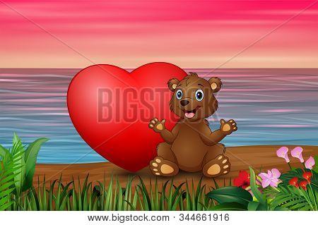 Funny Baby Bear Sitting With Red Heart In The Beach