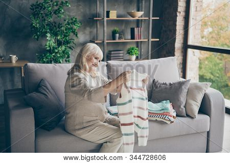 Profile Photo Of Amazing White Haired Aged Granny Holding Tidy Pullover Hands Put It In Stack Spring