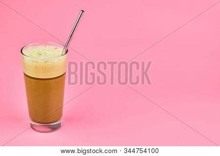 Traditional Green Ice Coffee Frappe In Glass With Metal Straw Isolated On Pink Background With Copy 