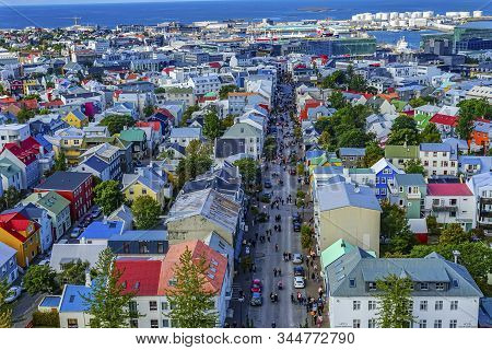 Reykjavik, Iceland - August 26, 2019 Colorful Red Blue Green Houses Cars Shopping Streets Harbor Rey