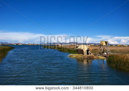 Drive Through The Strait On Lake Titicaca, Island Of Flotantes De Los Uros. La Paz, Puno, Peru.