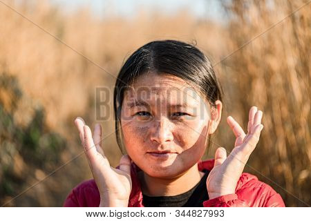 The Girl Is Traveling In The Grass Field Cockscomb Grass.