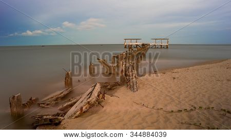 Dilapidated Old Fishing Dock Collapsing Into The Sea In Pak Nam Pran On The Gulf Of Thailand In Thai
