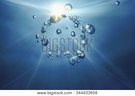 Underwater Air Bubbles With Sunlight. Underwater Background Air Bubbles