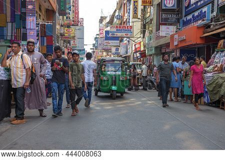 Colombo, Sri Lanka - February 23, 2020: Sri Lankans On The Street Of A Modern City