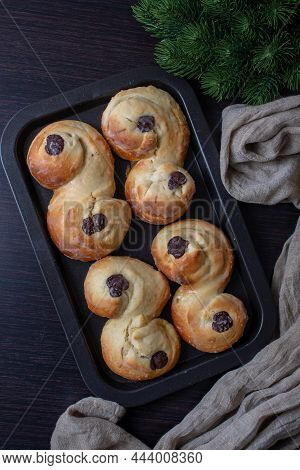 Swedish And Scandinavian Saffron Buns Lussekatter On A Table