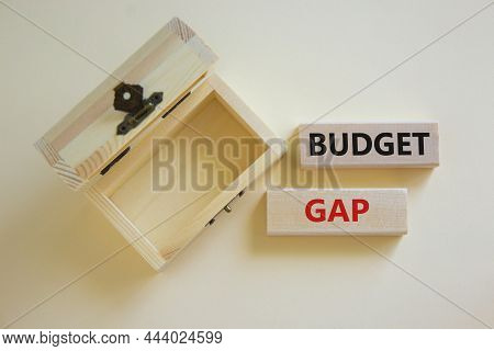 Budget Gap Symbol. Concept Words 'budget Gap' On Wooden Blocks On A Beautiful White Background, Empt