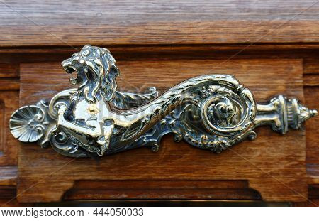 European Vintage Old Metal Wrought Iron Door Knocker. Design Detail. Paris.