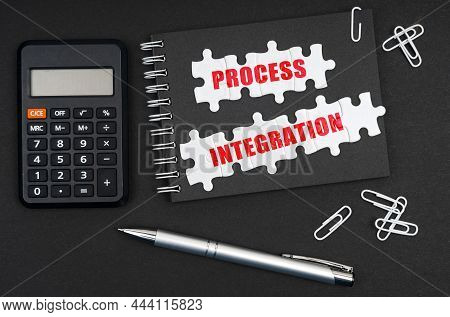 Business And Economics. On The Table Is A Calculator, A Pen And A Notebook With The Inscription - Pr