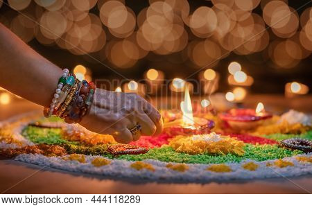 Traditional Diya Lamps Lit During Diwali Celebration