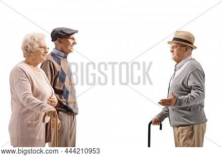 Edlerly man talking to an elderly couple isolated on white background
