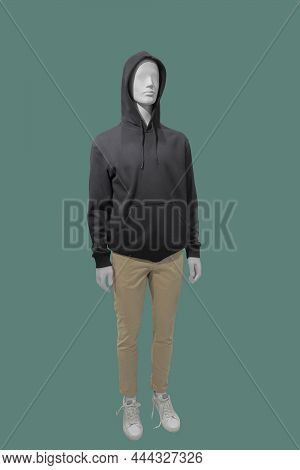 Full Length Image Of A Male Display Mannequin Wearing Black Hoodie With Kanga Pocket Isolated On A G