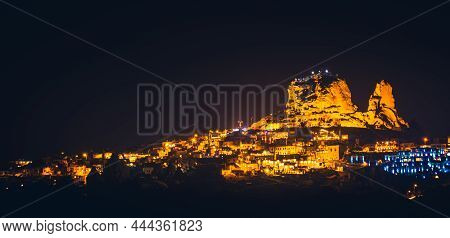 Panoramic Landscape Of Uchisar Castle At Night In Cappadocia, Central Anatolia, Turkey, Asia. Panora