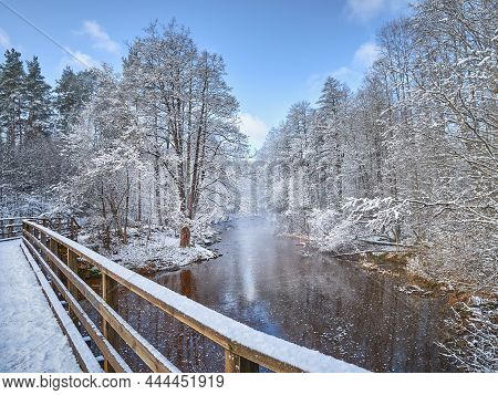 First Snow On The Forest Rapids Of Finnish Nukarinkoski: Sunny October Day.
