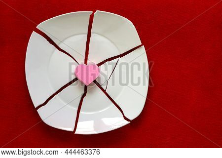 Heart Among The Fragments. Symbol Of Unhappy Love. Broken Heart Concept. White Shards And Heart. Pie