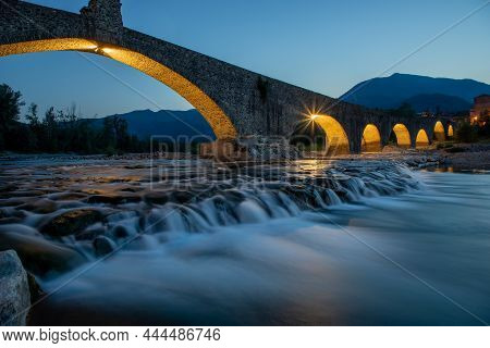The Ponte Gobbo  Is An Ancient Bridge With An Irregular Profile, Which Crosses The Trebbia River In 