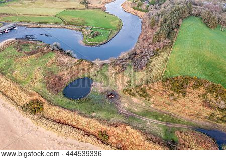 Aerial View Of The Historic Church And Graveyardof Inver In County Donegal - Ireland.