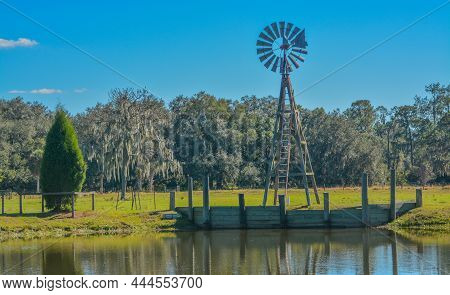 A Windmill On A Pond In Lithia, Hillsborough County, Florida