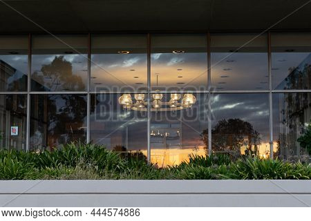 Los Angeles, Ca - December 28 2021:  Sunset Reflected In The Window Of The Coons Administration Cent