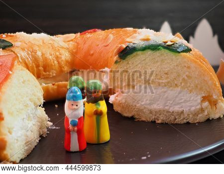 Roscon De Reyes With Cream And Figurines Melchor, Gaspar, Baltasar. Kings Day Concept Spanish Cake O