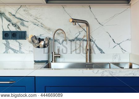 Modern Kitchen Interior. New Sink And Modern Tap In Stylish Kitchen. Clean Kitchen Sink, Close Up.