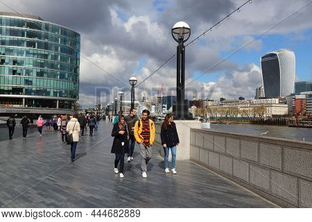 London, Uk - April 23, 2016: People Walk Along The Thames Embankment In London. London Is The Most P