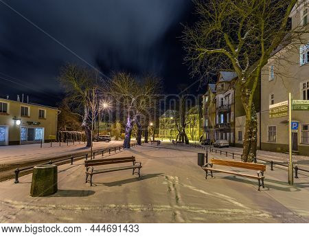 Poland, Gdansk, Oliwa - 23 February 2018: View Of The Illuminated, Snow-covered Old Town In Oliwa. W