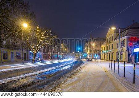 Poland, Gdansk, Oliwa - 23 February 2018: View Of The Illuminated, Snow-covered Old Town In Oliwa. W