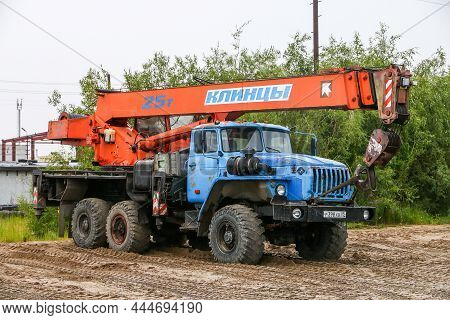 Novyy Urengoy, Russia - July 26, 2021: Heavy Construction Crane Ural 4320 In A City Street.