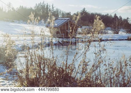 Small Fishing Hut On The Lake In Winter Denmark