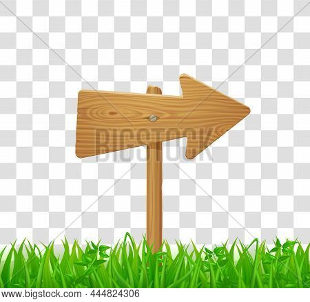 Wooden Direction Signboard On Post In Green Grass. Sign With Wood Board In Shape Of Arrow On Lawn Or