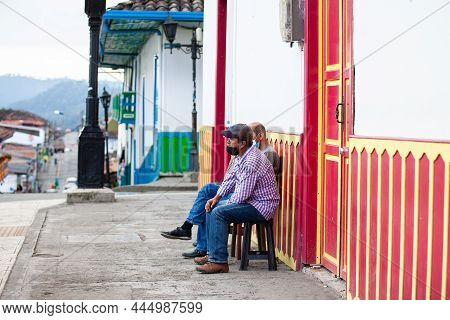 Salento, Colombia - July 2021. Group Of Men At The Beautiful Streets Of Salento An Small Town Locate