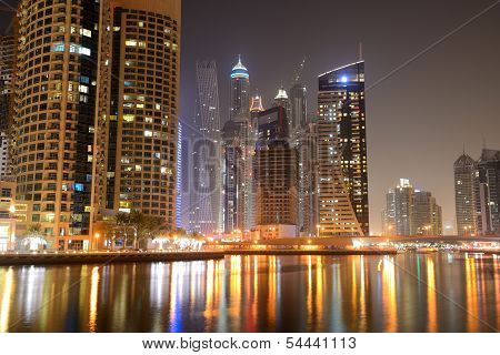 The Night Illumination At Dubai Marina And Cayan Tower,  Dubai, Uae