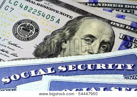 Social security card and US currency