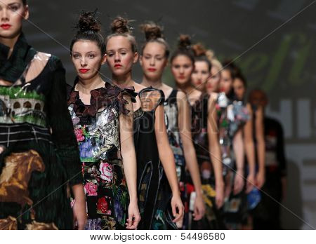 ZAGREB, CROATIA - NOVEMBER 22: Fashion models wearing clothes designed by Ana Kujundzic on the Zagreb Fashion Week show on November 22, 2013 in Zagreb, Croatia.