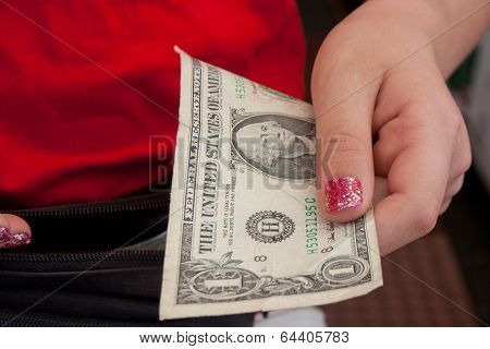 Girl Holding a Dollar Bill
